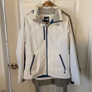 The North Face white and teal ski jacket. Size Women’s Medium.